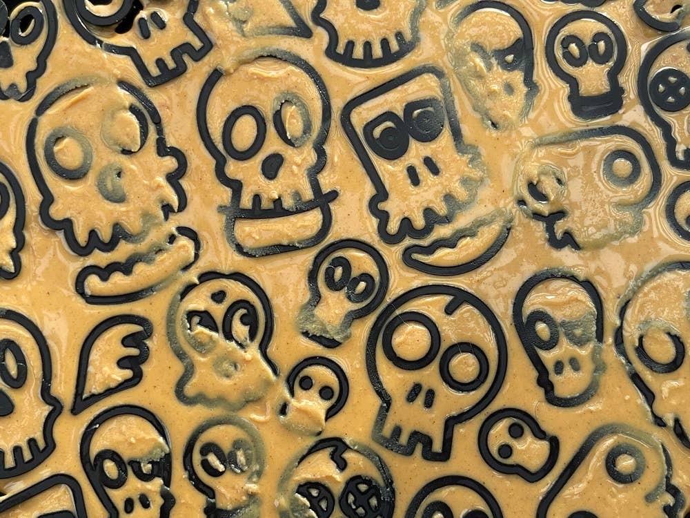 Tapis de léchage "tête de mort" orange - Taille L